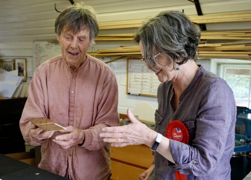 Glyn Thomas, left, in his studio with Emma